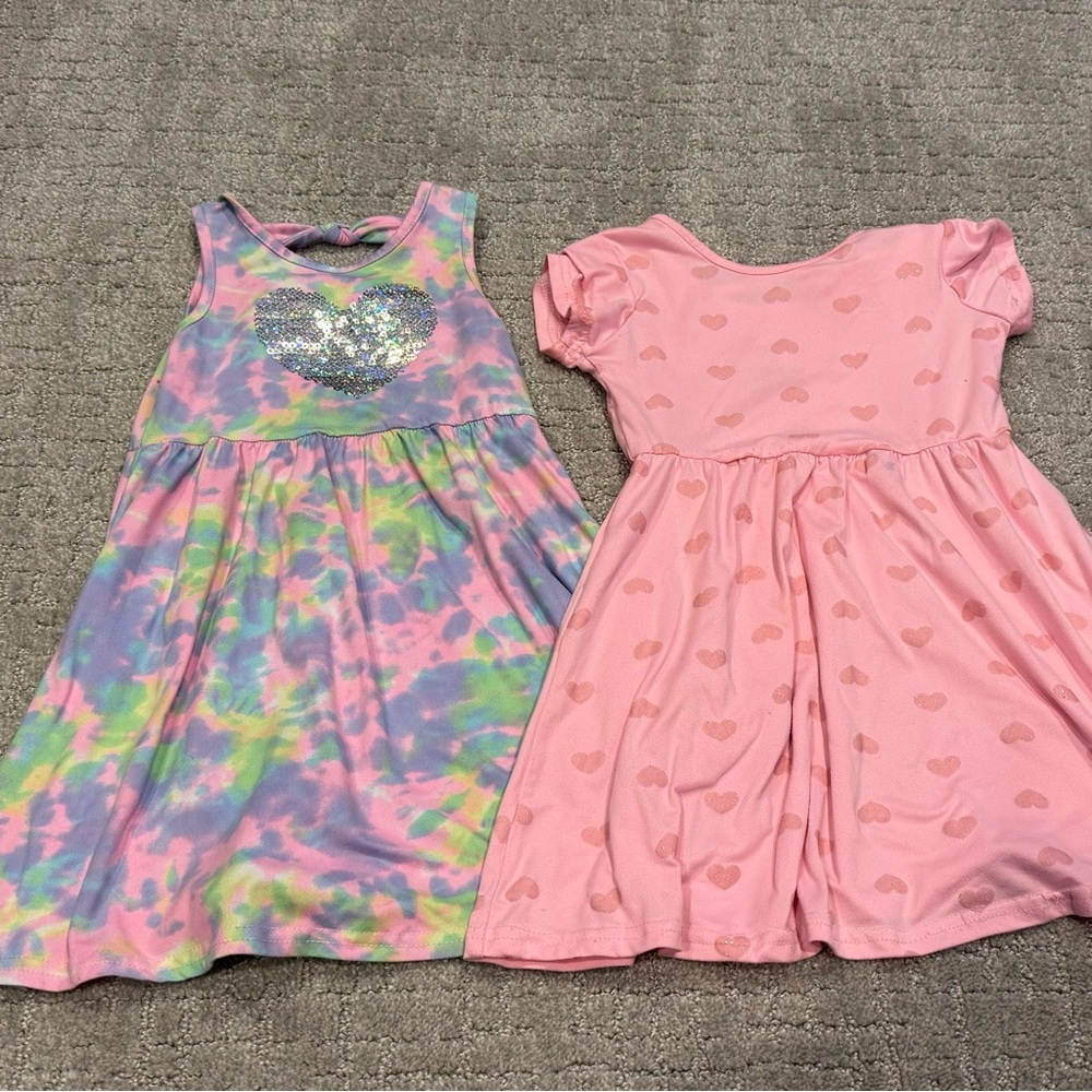 Two Freestyle revolution dresses Size 4